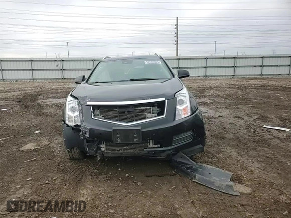 2014 Cadillac SRX Luxury Collection z VIN 3GYFNEE34ES685593, wystawiony jako Copart lot #52202805 z przebiegiem 139 869 mil mil oraz Szkoda całkowita • Salvage title. Historia ofert i sprzedaży dostępna na DreamBid. Obrazek 11.
