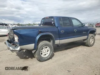 2002 Dodge Dakota SLT with VIN 1B7HG48N32S514521, listed as a Copart auction lot 48030635 with 321,011 mi miles and Salvage Title. Bid and sale history available at carsss.com. Image 3.