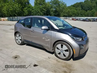 2014 BMW i3 with VIN WBY1Z4C50EV273070, listed as a Copart auction lot 66136085 with 84,455 mi miles and Salvage title. Bid and sale history available at DreamBid. Image 4.
