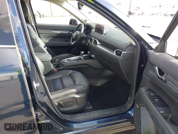 2021 Mazda CX-5 Grand Touring with VIN JM3KFBDM6M1312573, listed as a IAAI auction lot 41936739 with Not Provided miles and . Bid and sale history available at DreamBid. Image 5.