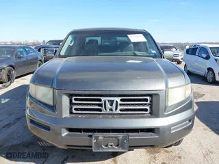 2007 Honda Ridgeline RTL w/Leather with VIN 2HJYK16547H526249, listed as a IAAI auction lot 41769625 with 173,168 mi miles. Bid and sale history available at carsss.com. Image 12.