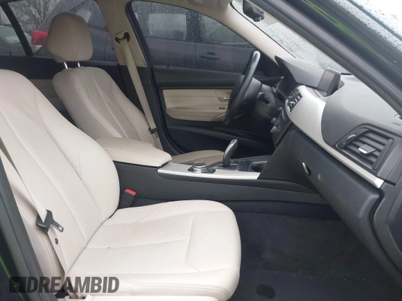 2015 BMW 3 Series 320i xDrive with VIN WBA3C3C57FP664631, listed as a IAAI auction lot 41117730 with 102,555 mi miles and . Bid and sale history available at DreamBid. Image 5.