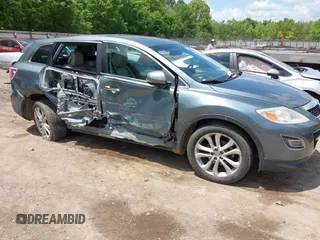 2012 Mazda CX-9 Grand Touring z VIN JM3TB2DA3C0355617, wystawiony jako IAAI lot #42198050 z przebiegiem 185 852 mil mil oraz . Historia ofert i sprzedaży dostępna na DreamBid. Obrazek 6.