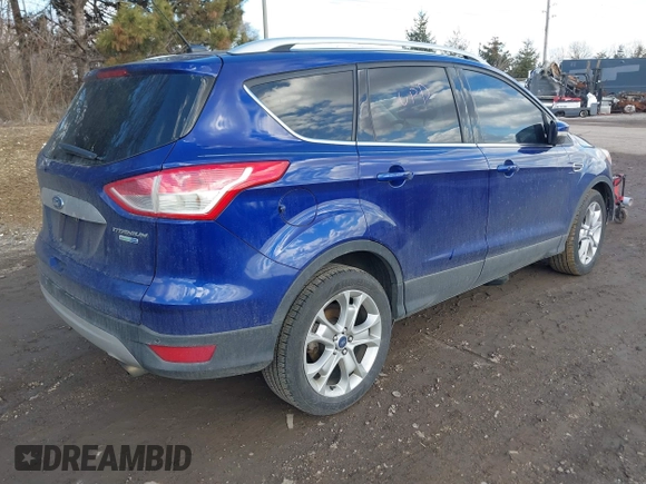 2016 Ford Escape Titanium with VIN 1FMCU9JX5GUA96563, listed as a IAAI auction lot 41695524 with 76,992 mi miles. Bid and sale history available at carsss.com. Image 4.