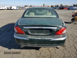 2004 Jaguar X-Type z VIN SAJEB52D94XD67350, wystawiony jako Copart lot #80131904 z przebiegiem 116 329 mil mil oraz Czysty tytuł • Clean title. Historia ofert i sprzedaży dostępna na DreamBid. Obrazek 6.