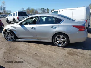 2013 Nissan Altima SV with VIN 1N4BL3AP0DN525913, listed as a IAAI auction lot 41893511 with 132,166 mi miles and . Bid and sale history available at DreamBid. Image 14.