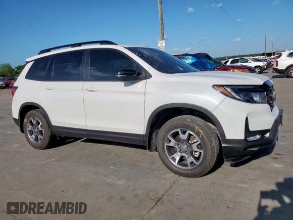 2023 Honda Passport TrailSport with VIN 5FNYF8H64PB007652, listed as a Copart auction lot 54064025 with 22,870 mi miles and Salvage title. Bid and sale history available at DreamBid. Image 4.