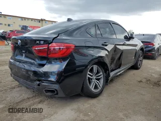 2015 BMW X6 xDrive35i with VIN 5UXKU2C50F0F94731, listed as a Copart auction lot 61715033 with 101,886 mi miles. Bid and sale history available at carsss.com. Image 3.