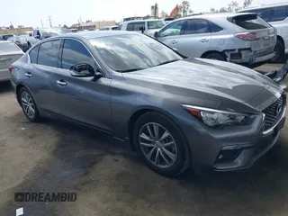 2021 Infiniti Q50 Pure with VIN JN1EV7AP3MM704464, listed as a IAAI auction lot 41915813 with 28,596 mi miles and . Bid and sale history available at DreamBid. Image 1.