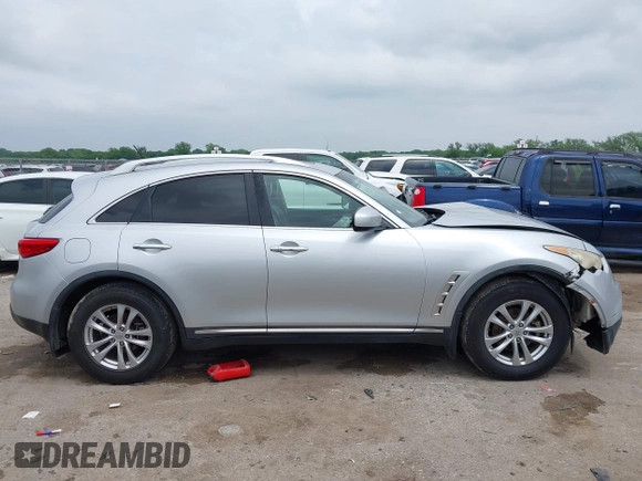 2010 Infiniti FX z VIN JN8AS1MW2AM852996, wystawiony jako IAAI lot #42163564 z przebiegiem 261 467 mil mil oraz . Historia ofert i sprzedaży dostępna na DreamBid. Obrazek 13.