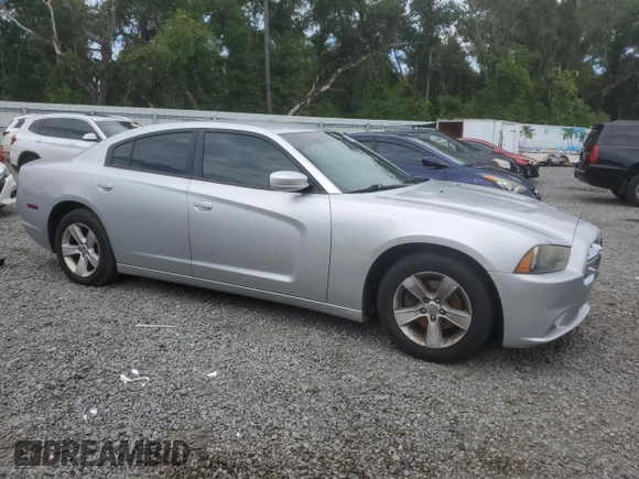 2012 Dodge Charger SE with VIN 2C3CDXBG4CH203207, listed as a Copart auction lot 69533004 with 156,015 mi miles and Salvage Title. Bid and sale history available at DreamBid. Image 4.