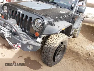 2011 Jeep Wrangler Rubicon with VIN 1J4BA6D13BL545343, listed as a IAAI auction lot 40980056 with 107,207 mi miles and . Bid and sale history available at carsss.com. Image 6.