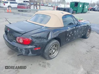 2004 Mazda MX-5 Miata LS with VIN JM1NB353040409951, listed as a IAAI auction lot 41848965 with 125,750 mi miles and . Bid and sale history available at DreamBid. Image 4.