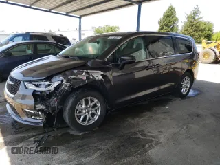 2023 Chrysler Pacifica Touring L with VIN 2C4RC1BG1PR581376, listed as a Copart auction lot 59901915 with 57,411 mi miles and Salvage title. Bid and sale history available at DreamBid. Image 1.