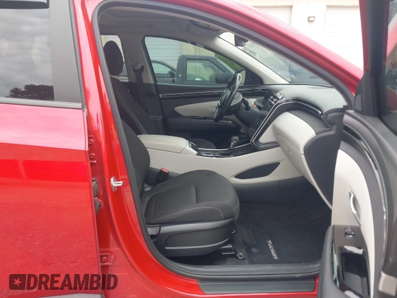 2022 Hyundai Tucson SEL z VIN 5NMJF3AE5NH135237, wystawiony jako IAAI lot #42324113 z przebiegiem 44 077 mil mil oraz . Historia ofert i sprzedaży dostępna na DreamBid. Obrazek 5.