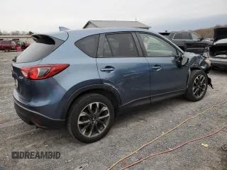 2016 Mazda CX-5 Grand Touring with VIN JM3KE4DY7G0761594, listed as a Copart auction lot 51514595 with 58,250 mi miles and Salvage Title. Bid and sale history available at DreamBid. Image 3.