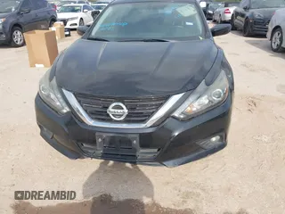 2017 Nissan Altima SR with VIN 1N4AL3AP0HC217024, listed as a IAAI auction lot 41729879 with 127,385 mi miles and . Bid and sale history available at carsss.com. Image 6.