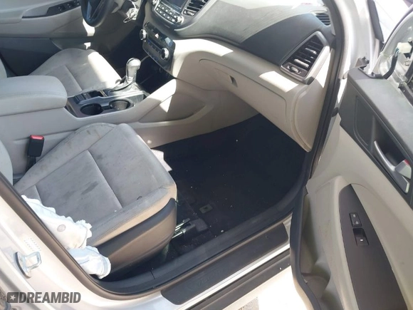 2018 Hyundai Tucson SE with VIN KM8J23A48JU646278, listed as a IAAI auction lot 41941577 with 115,228 mi miles. Bid and sale history available at carsss.com. Image 5.