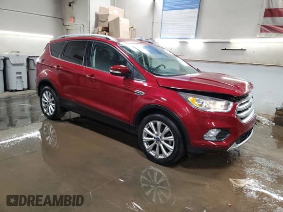 2017 Ford Escape Titanium with VIN 1FMCU0JD0HUE13538, listed as a Copart auction lot 49396125 with 36,733 mi miles and Salvage Title. Bid and sale history available at carsss.com. Image 4.