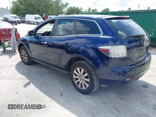 2010 Mazda CX-7 Sport with VIN JM3ER2W5XA0301457, listed as a IAAI auction lot 42257772 with 229,697 mi miles and . Bid and sale history available at DreamBid. Image 3.
