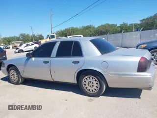 2003 Mercury Grand Marquis GS Convenience with VIN 2MEFM74W63X629935, listed as a IAAI auction lot 42048640 with 114,144 mi miles and . Bid and sale history available at DreamBid. Image 14.
