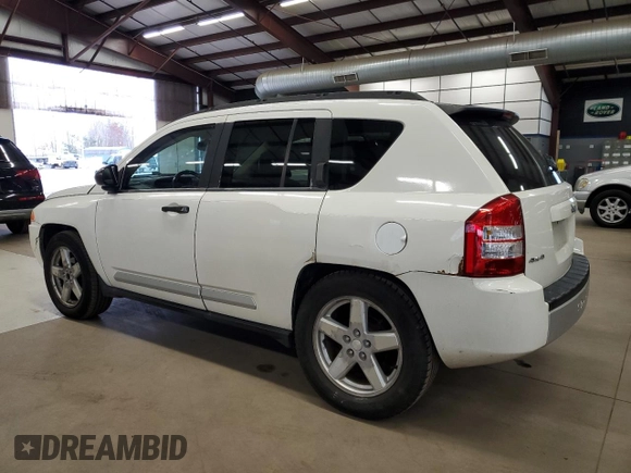 2007 Jeep Compass Limited with VIN 1J8FF57W97D103588, listed as a Copart auction lot 41534315 with 132,296 mi miles and Salvage Title. Bid and sale history available at carsss.com. Image 2.