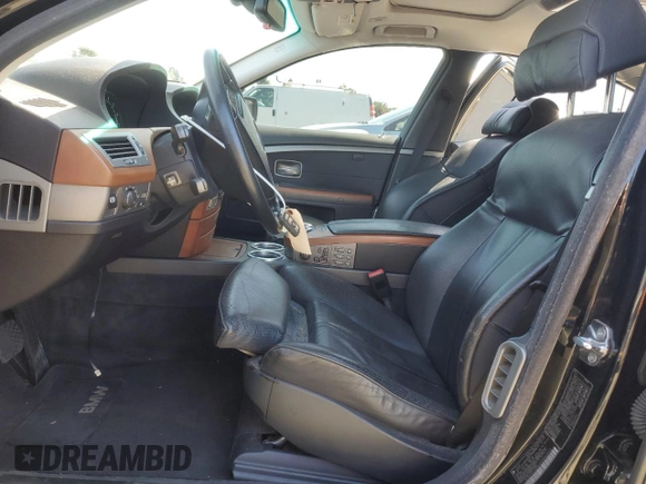 2003 BMW 7 Series 745i with VIN WBAGL634X3DP63533, listed as a Copart auction lot 49538815 with 126,926 mi miles and Salvage Title. Bid and sale history available at carsss.com. Image 7.