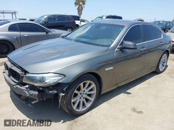 2014 BMW 5 Series 535i xDrive with VIN WBA5B3C57ED531072, listed as a IAAI auction lot 42574991 with 104,304 mi miles and . Bid and sale history available at DreamBid. Image 2.