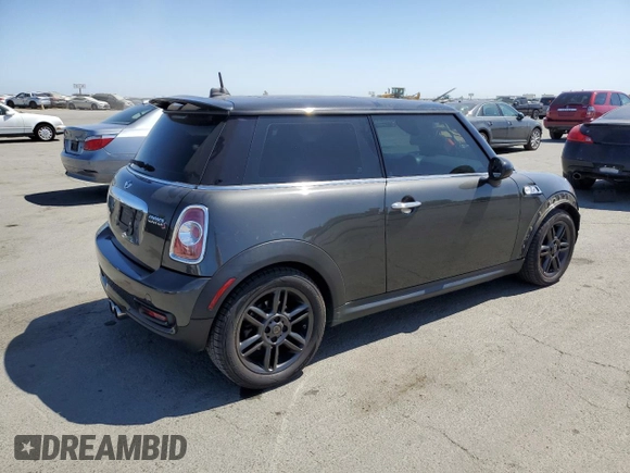 2012 MINI Hardtop S with VIN WMWSV3C57CTY16657, listed as a Copart auction lot 62812445 with 122,796 mi miles and Salvage title. Bid and sale history available at DreamBid. Image 3.