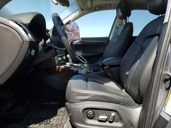 2016 Audi Q5 Premium Plus with VIN WA1L2AFP4GA003287, listed as a Copart auction lot 53576855 with 66,937 mi miles and Salvage Title. Bid and sale history available at carsss.com. Image 7.