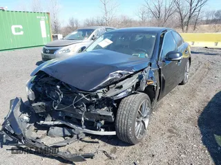 2014 Infiniti Q50 Premium with VIN JN1BV7AR0EM689783, listed as a IAAI auction lot 41661020 with 124,762 mi miles. Bid and sale history available at carsss.com. Image 21.