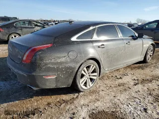 2014 Jaguar XJ with VIN SAJWJ2GD6E8V73491, listed as a Copart auction lot 42472345 with 68,747 mi miles and Salvage Title. Bid and sale history available at carsss.com. Image 3.