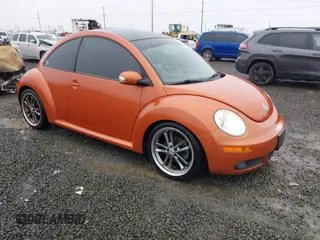 2010 Volkswagen New Beetle Coupe with VIN 3VWRG3AG3AM024689, listed as a IAAI auction lot 41037756 with 102,180 mi miles. Bid and sale history available at carsss.com. Image 1.