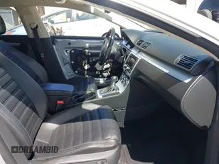 2014 Volkswagen CC R-Line with VIN WVWBP7AN0EE527649, listed as a IAAI auction lot 42009588 with 122,964 mi miles. Bid and sale history available at carsss.com. Image 5.