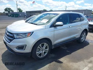 2015 Ford Edge Titanium z VIN 2FMTK4K95FBB47962, wystawiony jako IAAI lot #42234894 z przebiegiem Nie podano mil oraz . Historia ofert i sprzedaży dostępna na DreamBid. Obrazek 17.
