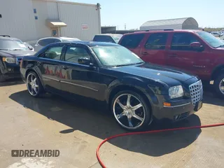2006 Chrysler 300 Touring with VIN 2C3KA53G46H435401, listed as a IAAI auction lot 41662596 with 205,503 mi miles and . Bid and sale history available at DreamBid. Image 1.