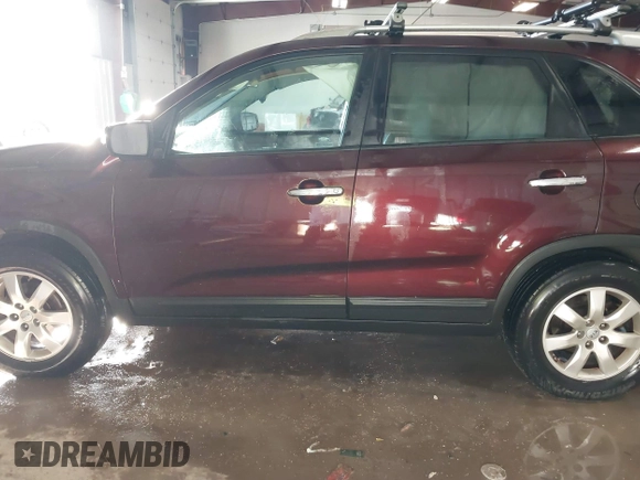2013 Kia Sorento LX with VIN 5XYKT4A27DG315059, listed as a IAAI auction lot 41571574 with 217,527 mi miles. Bid and sale history available at carsss.com. Image 15.