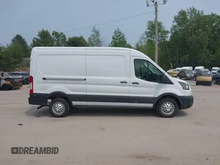 2024 Ford Transit Cargo with VIN 1FTBR2C82RKA72122, listed as a IAAI auction lot 42432209 with 26,806 mi miles and . Bid and sale history available at DreamBid. Image 13.