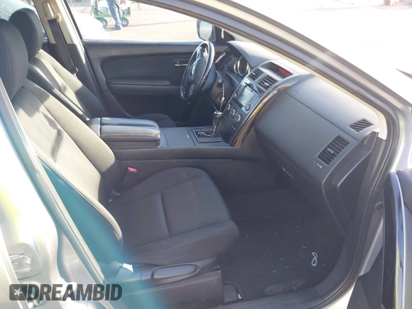 2015 Mazda CX-9 Sport with VIN JM3TB2BA3F0464294, listed as a IAAI auction lot 40848645 with 116,778 mi miles and . Bid and sale history available at carsss.com. Image 5.