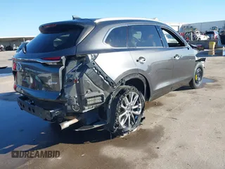 2017 Mazda CX-9 Signature with VIN JM3TCBEY6H0129927, listed as a IAAI auction lot 41739530 with 67,913 mi miles and . Bid and sale history available at DreamBid. Image 4.