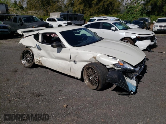 2014 Nissan 370Z Nismo with VIN JN1AZ4EH2EM630833, listed as a Copart auction lot 81773274 with 38,051 mi miles and Salvage Title. Bid and sale history available at DreamBid. Image 4.