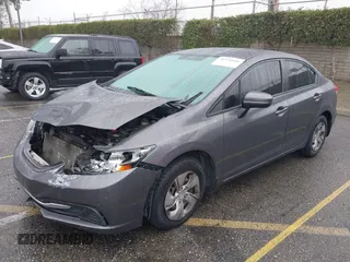 2015 Honda Civic Sedan LX with VIN 19XFB2E59FE014421, listed as a IAAI auction lot 41556046 with 141,922 mi miles. Bid and sale history available at carsss.com. Image 2.