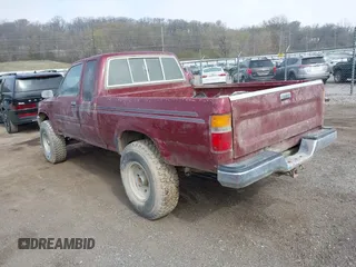 1990 Toyota Pickup SR5 z VIN JT4VN13G8L5037875, wystawiony jako IAAI lot #41986781 z przebiegiem 321 404 mil mil oraz . Historia ofert i sprzedaży dostępna na DreamBid. Obrazek 3.