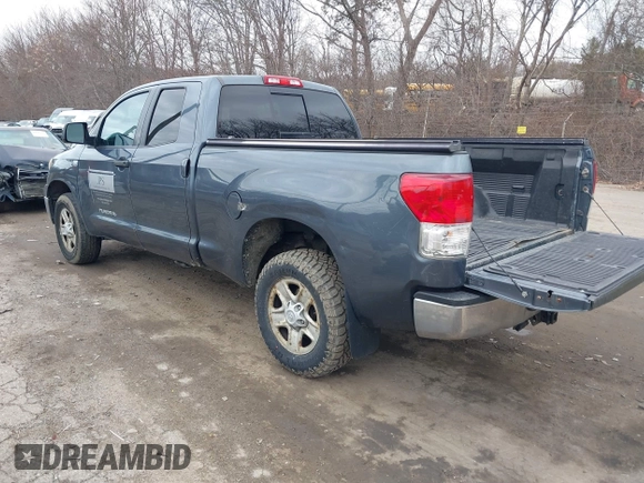 2010 Toyota Tundra with VIN 5TFUM5F16AX005232, listed as a IAAI auction lot 41688311 with 251,296 mi miles and . Bid and sale history available at DreamBid. Image 3.