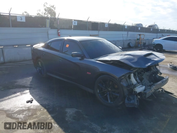 2019 Dodge Charger Scat Pack with VIN 2C3CDXGJ7KH588717, listed as a IAAI auction lot 41694673 with Not Provided miles and . Bid and sale history available at DreamBid. Image 1.
