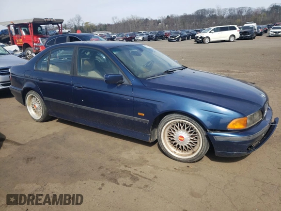 2000 BMW 5 Series with VIN WBADM5346YBY17536, listed as a Copart auction lot 53783665 with Not provided miles and Salvage title. Bid and sale history available at DreamBid. Image 4.