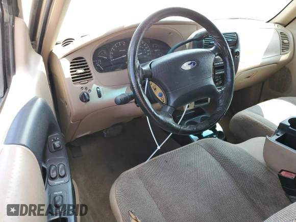 2002 Ford Ranger XLT Appearance with VIN 1FTYR44E32TA51614, listed as a Copart auction lot 61653905 with 194,762 mi miles and Salvage title. Bid and sale history available at DreamBid. Image 8.
