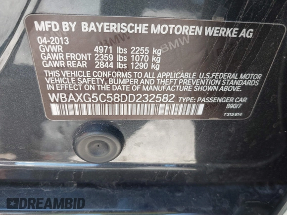 2013 BMW 5 Series 528i with VIN WBAXG5C58DD232582, listed as a IAAI auction lot 41890082 with 150,401 mi miles and . Bid and sale history available at carsss.com. Image 9.