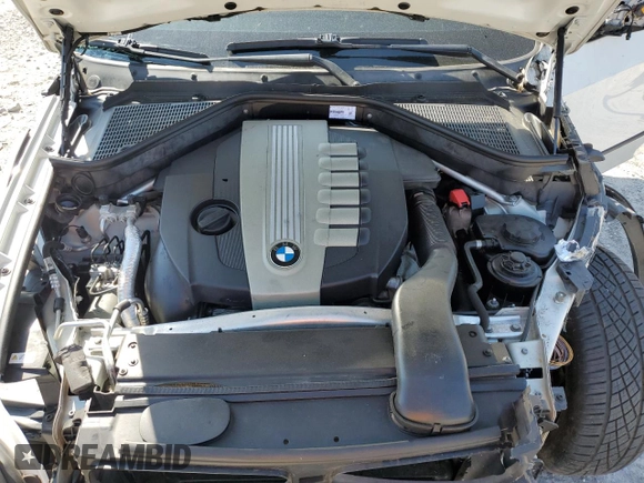 2011 BMW X5 35d с VIN 5UXZW0C58BL369718, выставлен на аукционе Copart как лот 54735695 с пробегом 199 303 миль миль и Списание • Salvage title. История ставок и продаж доступна на DreamBid. Изображение 12.