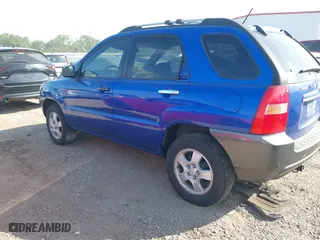2007 Kia Sportage LX with VIN KNDJF724277382562, listed as a IAAI auction lot 42047497 with 144,079 mi miles. Bid and sale history available at carsss.com. Image 3.